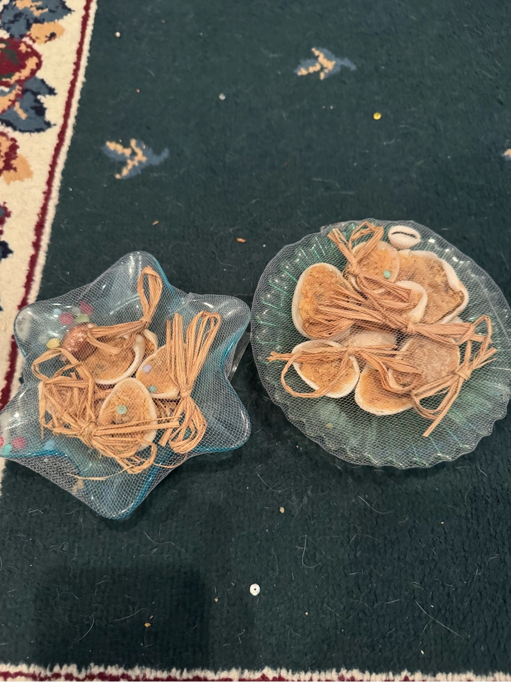 2 glass bowls with goats milk shell soap